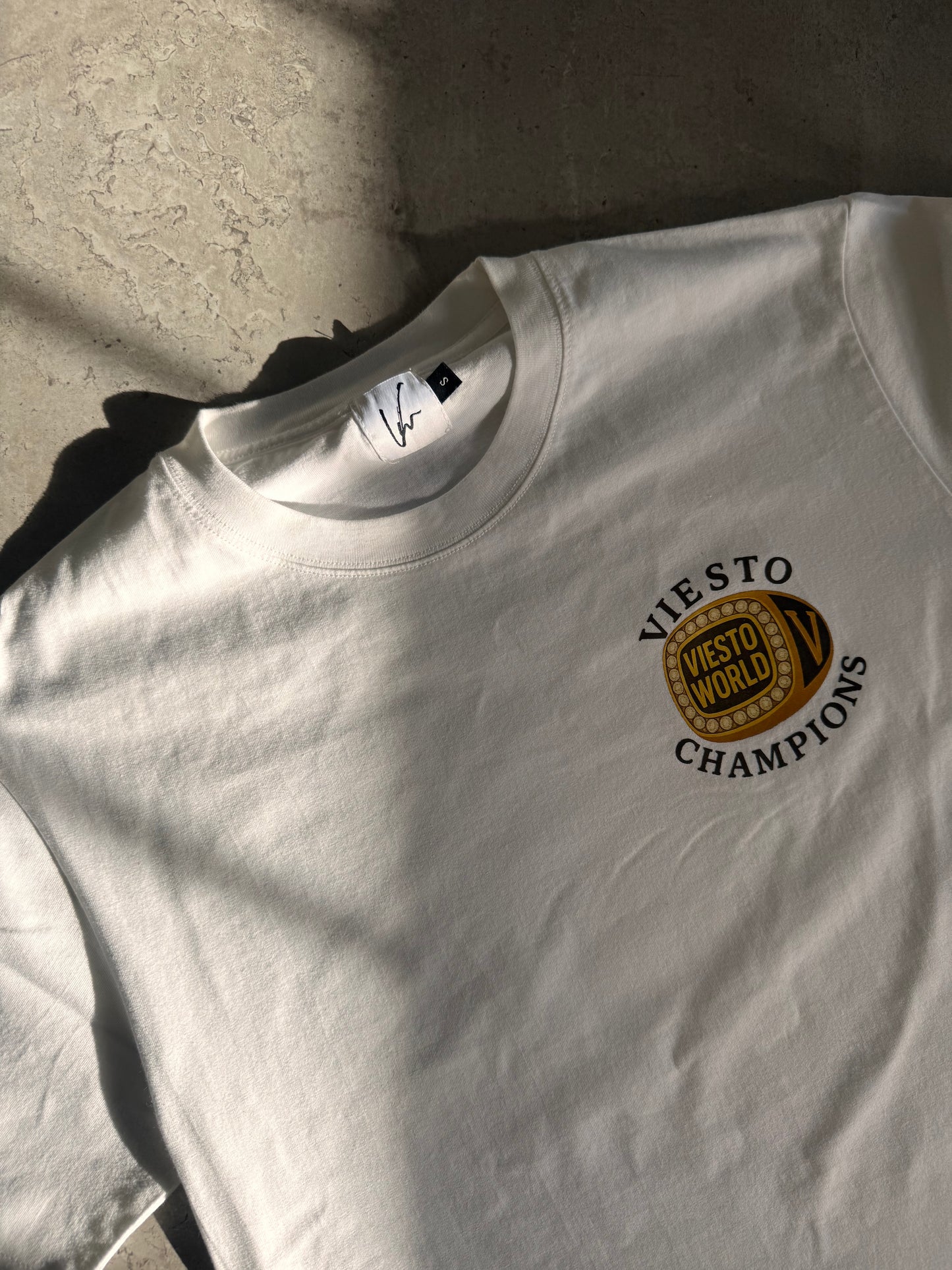 "Champions" Graphic White T Shirt